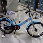 size 20 kids bike with training wheels back seat and front basket age 6yrs to 12yrs