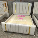 5X6 BED WITH GOLD DECORATIVE RIBBONS